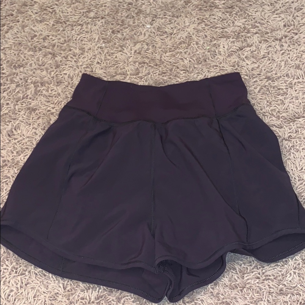 High waisted dark purple Lulu shorts